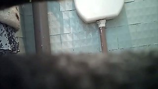 White stranger chick in the toilet room gets spied with camera