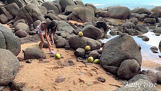 Naked Girl Found a Coconut on a Beach and Poured the Juice Over Her Body