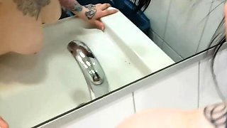 Public toilet fuck with German black-haired teen