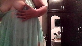 Mature milf in lingerie part two shows her big ass and touches herself