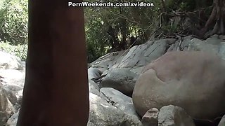 Blowjob in front of waterfall