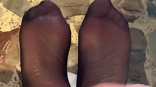 Cumming soles of feet to secretary POV