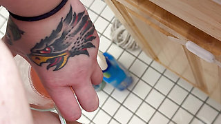 Just peeing somewhere in the bathroom