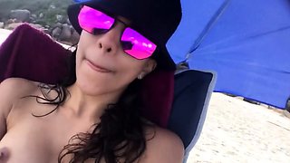 First-time Nudist Hesitates to Undress on Beach