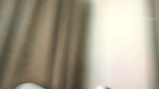 Cute amateur asian web cam girl playing with her toy