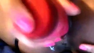 Black Girl Masturbating with a Pink Dildo