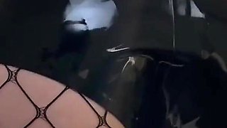 Latex Tease in Fishnets and Boots