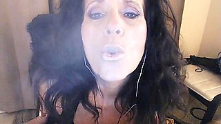 MATURE AMATEUR cums hard during Live Phonesex w/ smoking, foot & pussy play