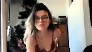 Brunette with glasses masturbates hairy pussy