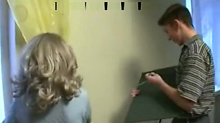Son Helps Not His Mom Hang Curtains