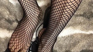 Fishnet in Open Toe Shoes with Red Nail Polish