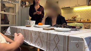 My husband jerking under a table front of my step mom and i right at the kitchen.