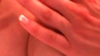 Beautiful blonde with big tits playing in the bathroom