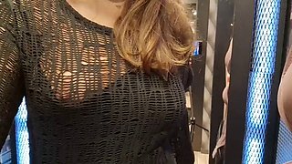 Open curtain in fitting room public flashing of tits