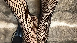 Fishnet in Open Toe Shoes with Red Nail Polish