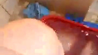 Scrubbing my big feet and legs with a brush