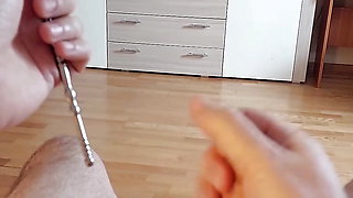 Urethral cock sounding play and cumshot through hollow sounding plug