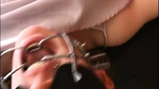 Fetish lesbians toy their asses with plugs