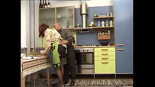 Red hair girl anal fucking in the kitchen