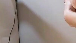 A Woman in an Armchair Satisfies Herself with Her Fingers