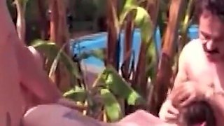 Outdoor Pool Party Is Made Complete by a Dancing Girl and a Double Penetration Threesome.