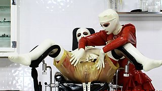 Horny latex lesbians Lucy Zara and Kandi Kay get it on