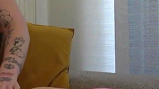 Tattooed Slut with Curly Hair Adores a Clean Belly Button