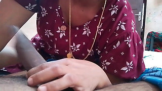 The wife puts her husband's penis in her mouth and gives him a good blowjob, and they both enjoy it.