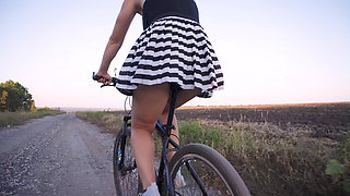 Flashing Ass While Riding a Bicycle Under Skirt