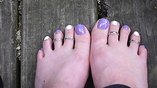 Purple and White Toes Wiggling Wearing Toe Rings