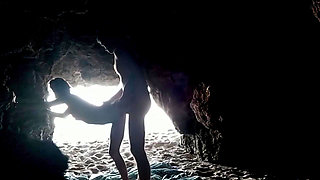 Couple recorded at the beach, inside the cave