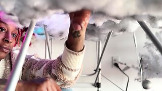 Pierced and tattooed boy sucking black cock from glory hole