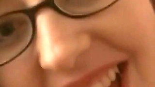 Tattooed brunette Audrey Alder mouth fucks big cock