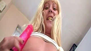Blonde Fucks Herself Deep with Pink Dildo