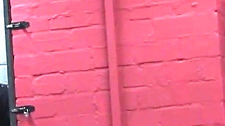 Purple-haired Dominatrix Whips Her Bound Slave Hard