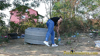 Pee standing on a dirt road in the countryside - Wet her panties outdoor and smoke until they dry