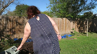 Playing in my garden showing off my tits belly ass, legs and fat pussy flashing you while cleaning up my leaves! red lace thong!