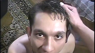 Guy is half naked and flexing for the camera