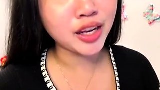 Beautiful Thai teen squirting on camera 83235608787651123489