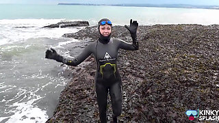 Rubbery Beach Encounter: Lucy's Neoprene Pussy Play with Stranger