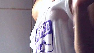 Beautiful teen brunette broad masturbates in the shower