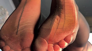 Watch Me Tease You with My Ripped Nylon Feet Through the Glass