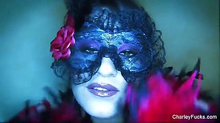 Dolled up Charley Chase plays with her pussy