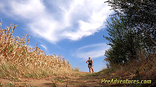 Pissing on a dirt road in the middle of no-were