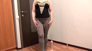 A immense fake penis pokes my buttfuck. A black-haired with a glorious arse undresses her stockings and strokes.