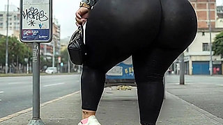 "Masked BBW Changes from Black Leggings to Tiny Thong at Public Bus Stop"
