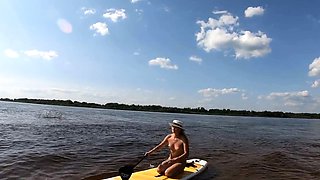 Big-Ass Blonde's Naked Walk on a Paddleboard
