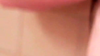 Cute brunette lesbians pleasuring each other in the bathroom