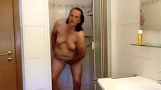 Fat woman gets really wet  hot shower show