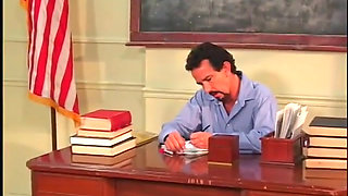 Hot ass chick on desk gets cum in mouth after hot fucking from teacher dude
